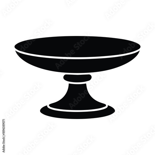 Elegant black silhouette of a cake stand or pedestal dish, suggesting serving food or display