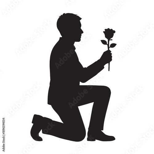 Romantic Silhouette of Man Kneeling with Flower