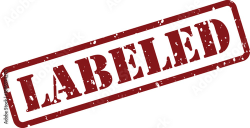 A bold red rubber stamp showing the word LABELED with a distressed texture on a bright white surface