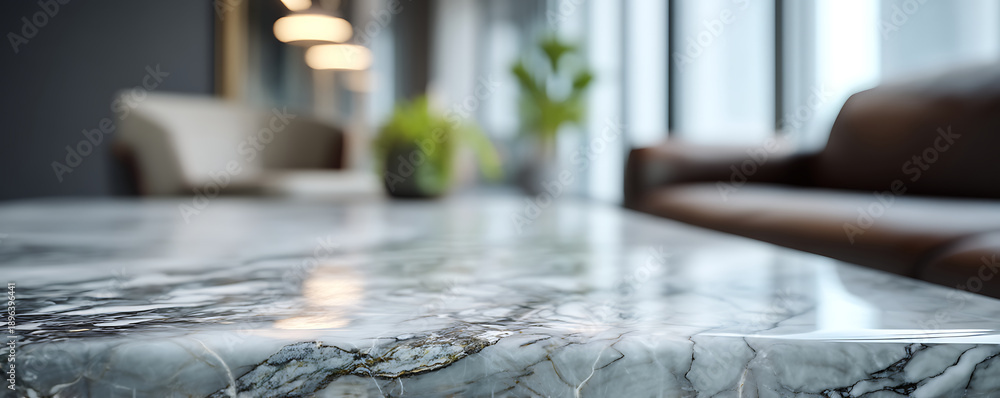 Obraz premium Elegant Marble Surface Foreground with a Softly Blurred Modern Interior Living Space in the Background