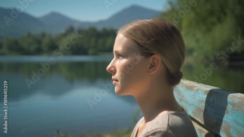 Wallpaper Mural Contemplative woman by lake scenic beauty and peaceful reflection in nature Torontodigital.ca