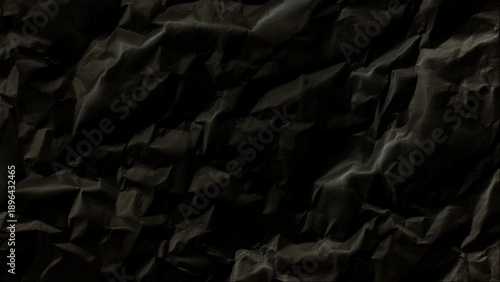 Closeup of crumpled dark paper texture