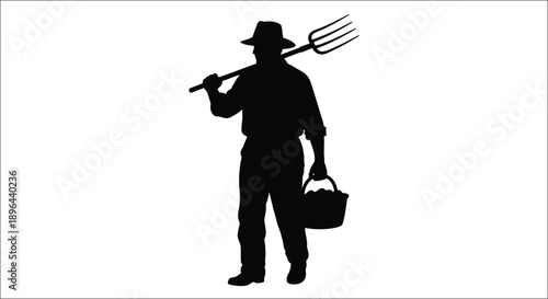 Farmer with pitchfork and basket a striking black silhouette
