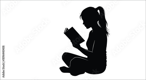 Young woman reading a book in a seated position silhouette