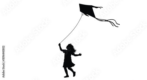 Child flying a kite against a bright sky a striking silhouette