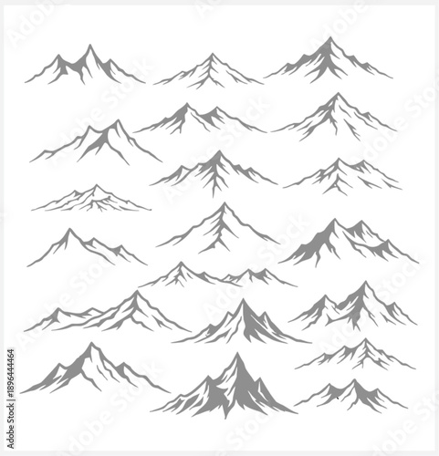Multiple mountain peaks in a range of shapes and sizes
