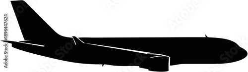 Silhouette of Commercial Airplane in Flight.