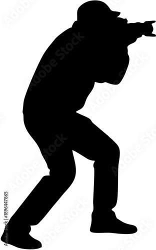 Silhouette of Man Shooting Handgun Sideways.