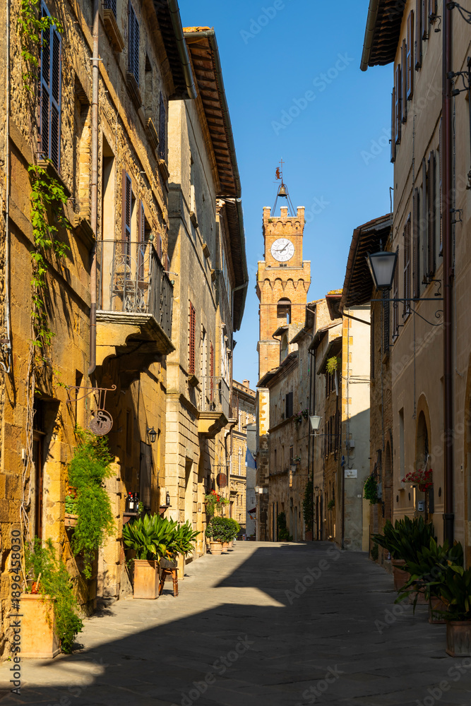 Fototapeta premium Corso Il Rossellino street with Palazzo Comunale clock tower, Pienza