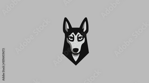 A geometric illustration of a canine face, with black, white, and gray tones on a neutral background