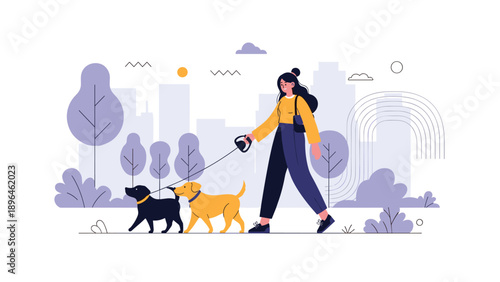 Woman enjoys a walk with two pet dogs on leashes through a city park with tall buildings and trees in the background.