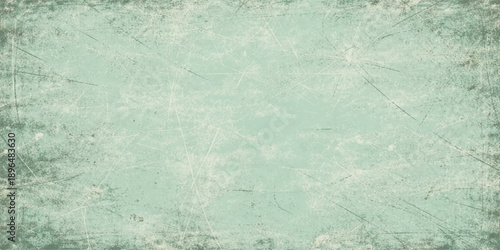 An abstract blue grunge background with a vintage paper texture and rough aged paint on a weathered wall surface provides a blank artistic backdrop for design