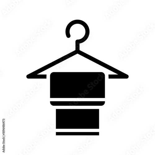 Black solid icon towel. Minimalist glyph icon isolated background.