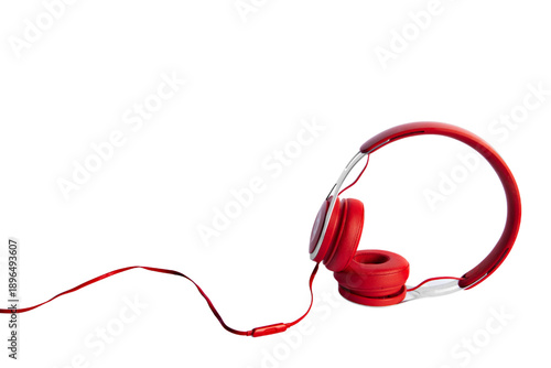 Modern Red Wired Headphones on Plain White Background with Large Copy Space, Music and Audio Concept