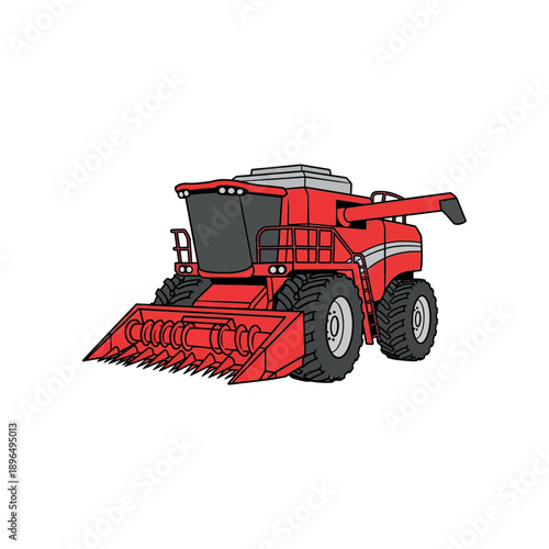 A red combine harvester is operating in a field with large black wheels.