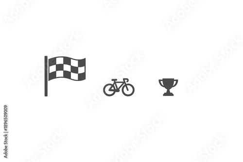 Bicycle race with checkered flag and trophy at finish line during daytime event in open area with spectators