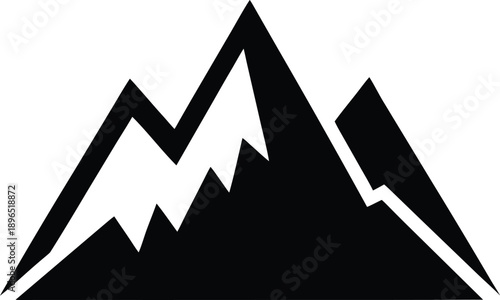 Silhouette of a mountain range with peaks and ridges in black