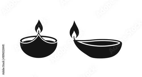 Two traditional oil lamps illustrated in a striking black silhouette