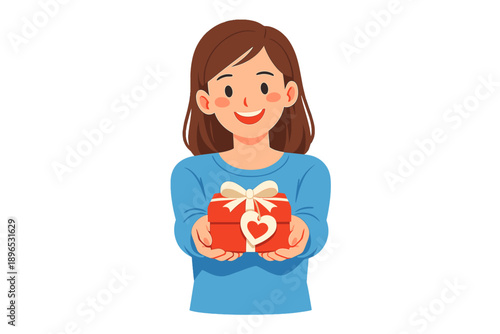 Girl holds gift box with heart shape ribbon in hands and smiles happily at the camera during a cheerful moment