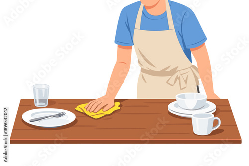 Person wipes a wooden table after a meal with dirty dishes in a kitchen setting during daytime