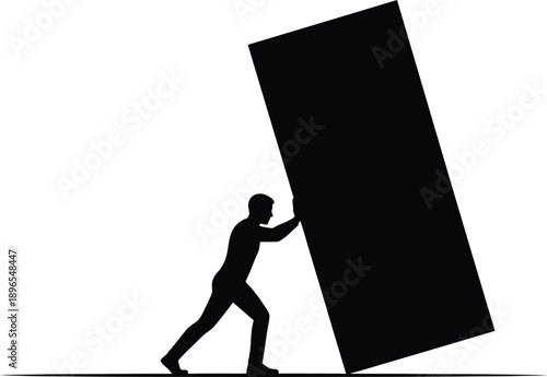 Man pushing large black rectangle with effort and determination