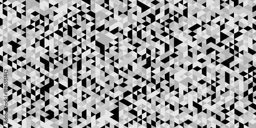 Abstract geometric pattern composed of interlocking triangles shapes, rendered in a monochrome black, white, and gray palette, the design features sharp angles modern, minimalist background.