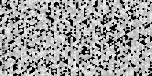 Abstract geometric pattern composed of interlocking triangles shapes, rendered in a monochrome black, white, and gray palette, the design features sharp angles modern, minimalist background.