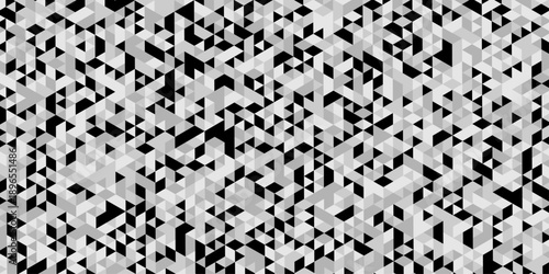 Abstract geometric pattern composed of interlocking triangles shapes, rendered in a monochrome black, white, and gray palette, the design features sharp angles modern, minimalist background.