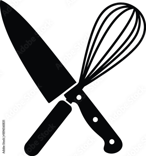 Chef knife and a wire whisk kitchen utensil. 
