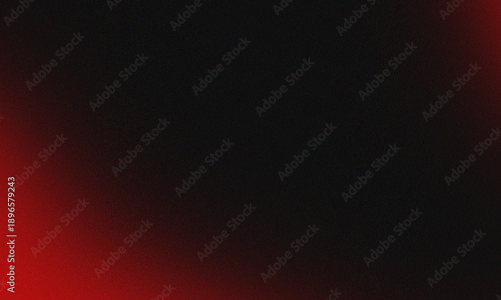 Fototapeta premium Abstract grainy background features a subtle gradient transition from deep black to an intense glowing red hue creating texture