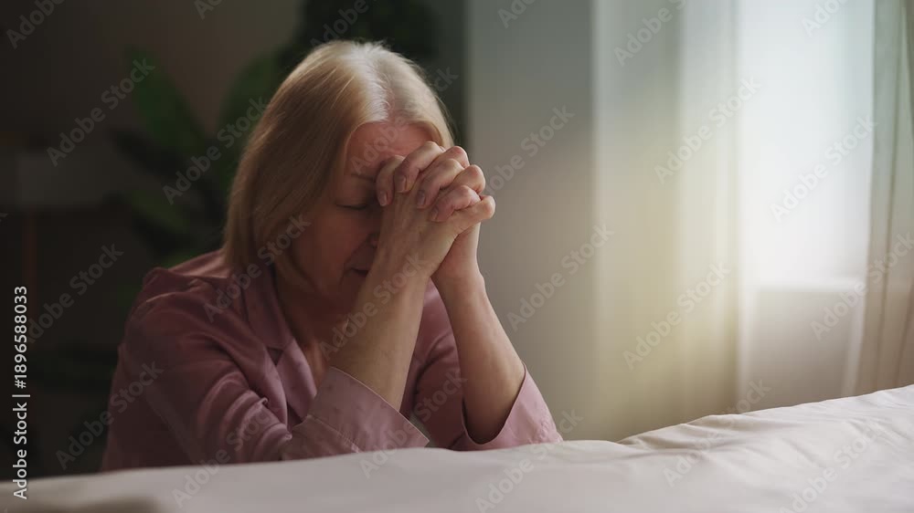 custom made wallpaper toronto digitalSenior woman putting hands together in prayer, asking God for health and mercy