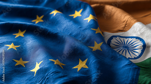 eu flag waving next to indian flag. relations between european union and india