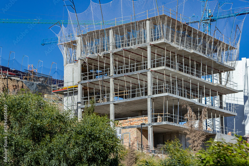 Fototapeta premium Construction d’un immeuble à appartements moderne pour achat ou vente