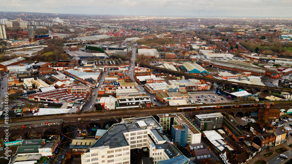 Fototapeta premium Aerial view of the industrial district and railway viaducts