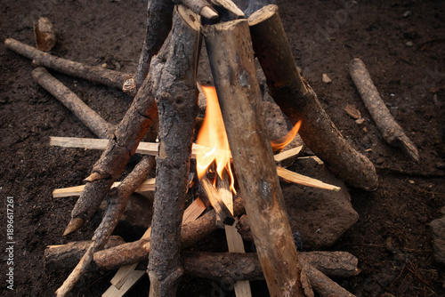 campfire at an outdoor campsite.