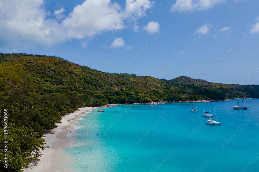 Fototapeta premium Stunning turquoise waters and golden sands at Anse Lazio in Praslin Seychelles