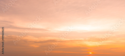 Beautiful morning or evening red or orange sky with cloudy while sunsets or sunrises taken at the sea used as natural blackground texture