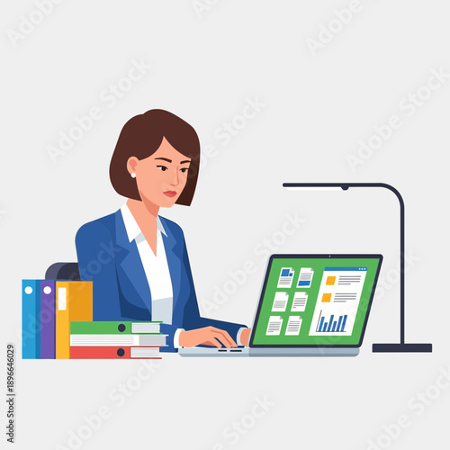 Businesswoman working at a desk with a laptop and binders