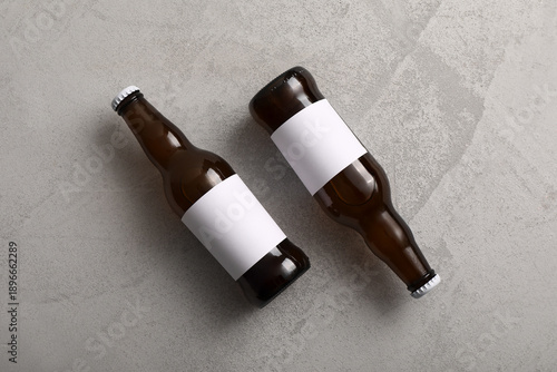 Bottles of cold beer on whi...