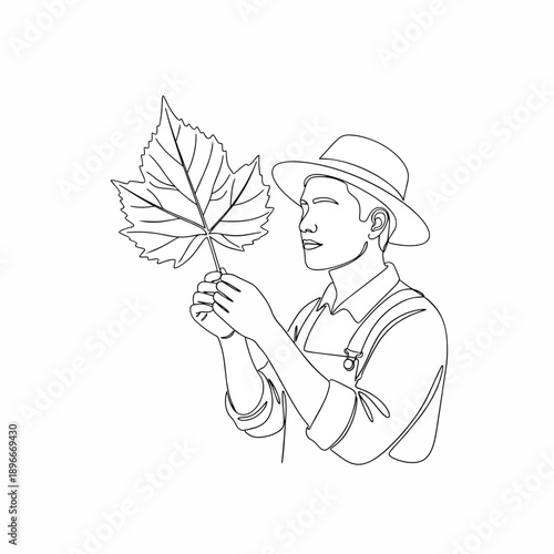Farmer Inspecting Grape Leaf