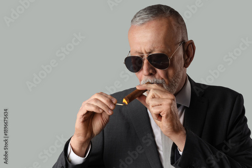 Old businessman in sunglass...