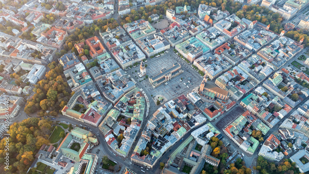 Fototapeta premium Aerial View of Krakow Main Market Square and Historic City Center in Autumn With Rooftops and Dense Urban Architecture