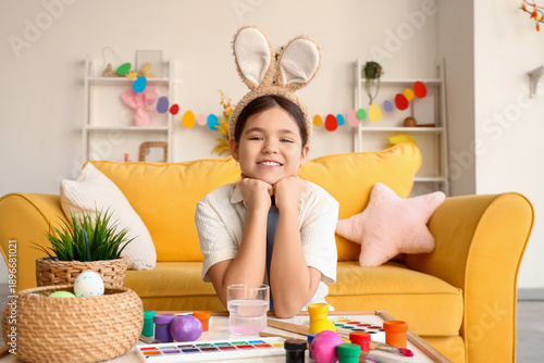 Cute girl in bunny ears at ...