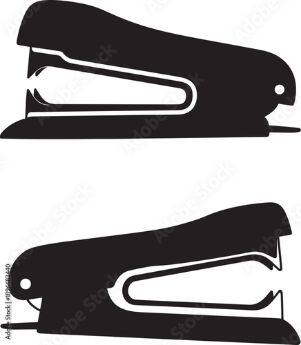 Black silhouettes image of two metal staplers side by side