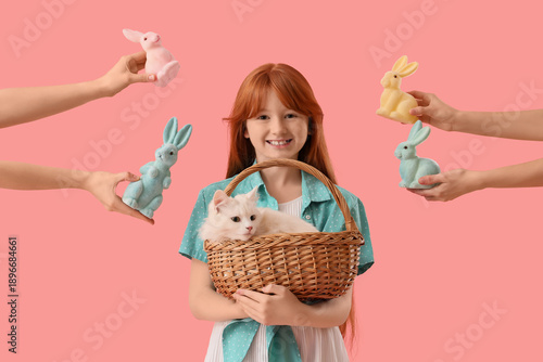Cute girl holding wicker ba...