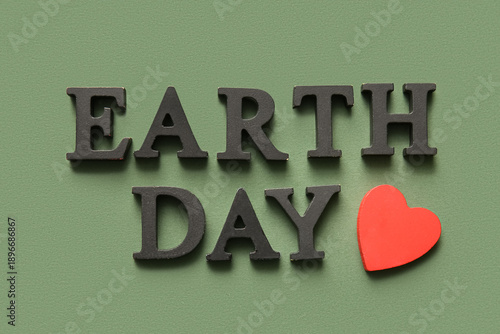 Text EARTH DAY with heart o...