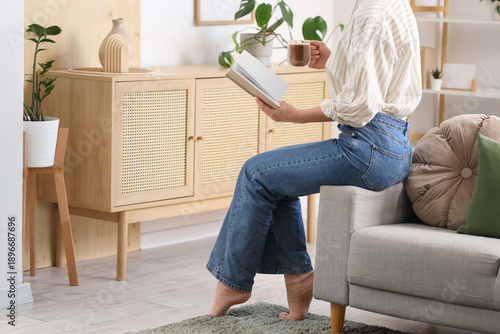 Young woman with book and g...