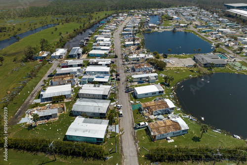 Wallpaper Mural Wind damage of private houses after hurricane swept through Florida mobile home residential area. Consequences of natural disaster Torontodigital.ca