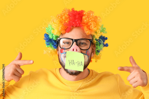 Young man in clown disguise...