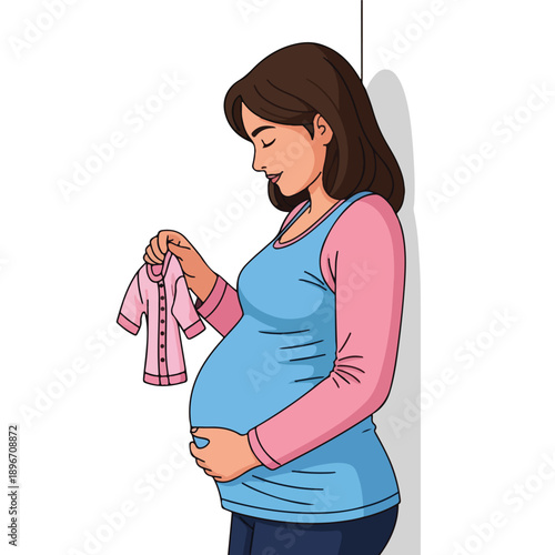 A pregnant woman smiling while holding baby clothes